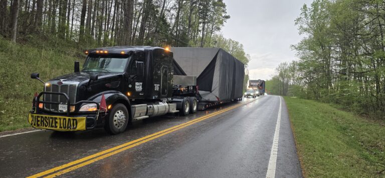 Heavy Haul solutions tractor hauling oversize building modules.