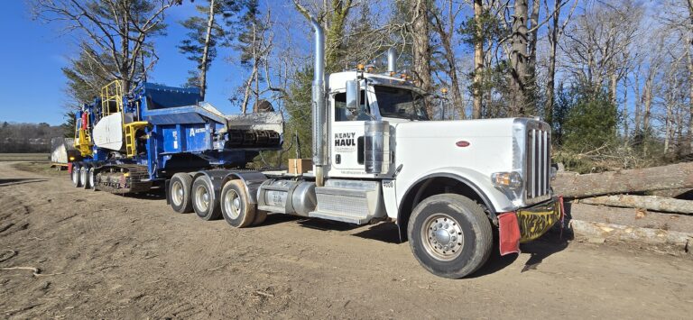 Heavy Haul Solution day cab hauling oversized equipment to site.